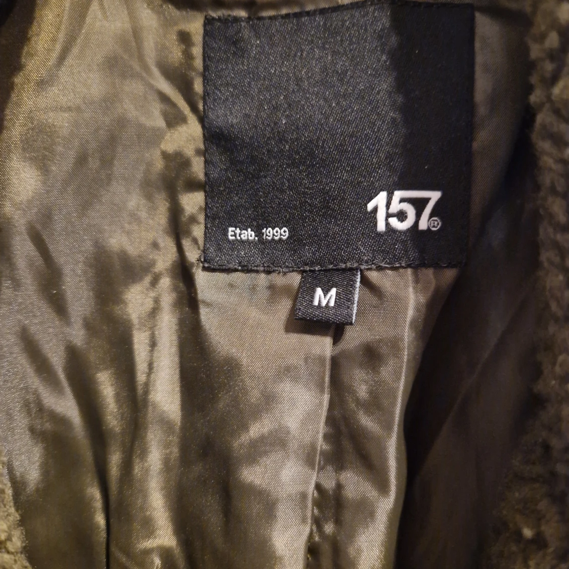 Olivgrön teddyjacka från 157 - 92