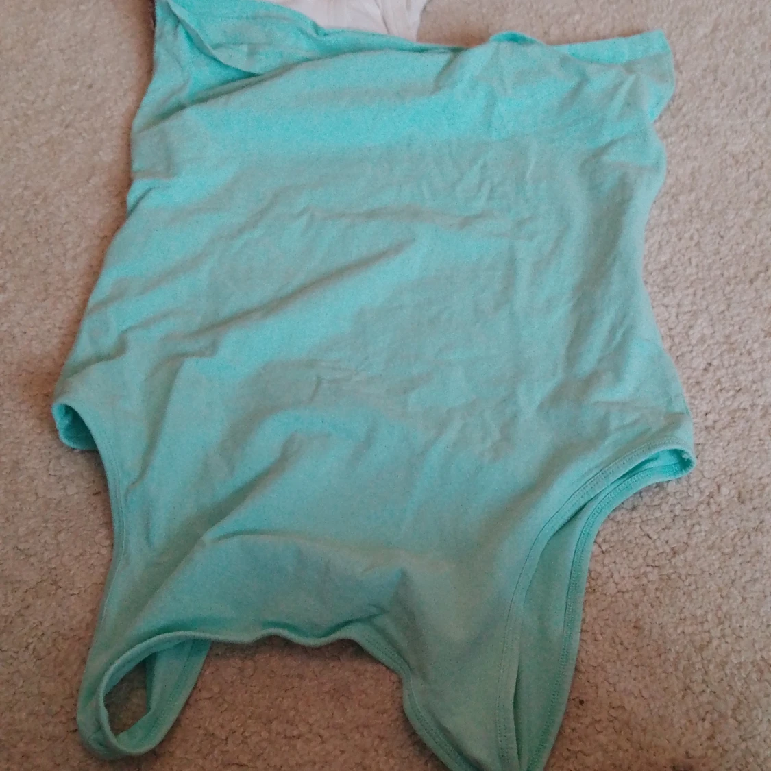 Turkos ärmlös linnetopp - 91