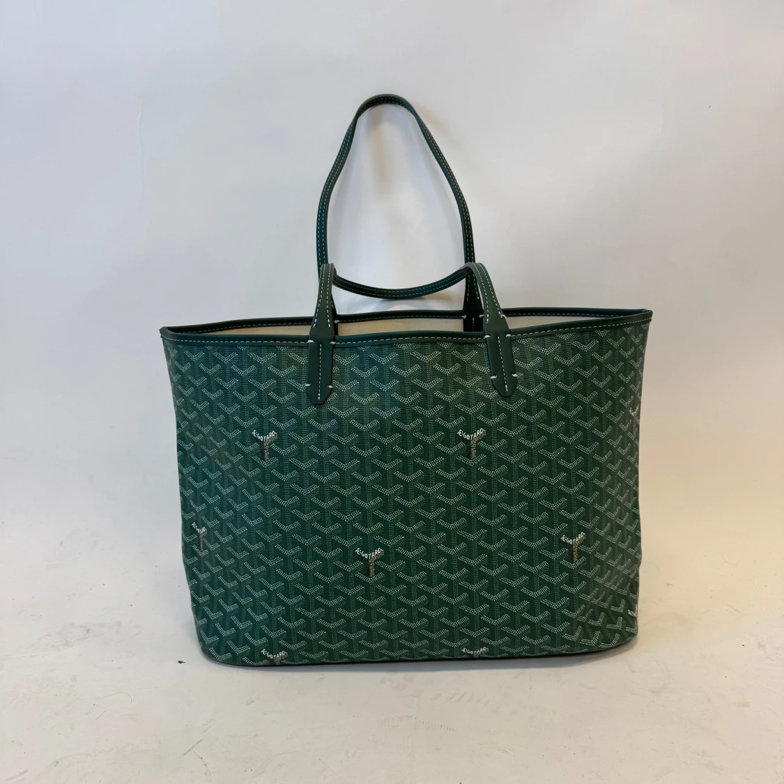 Grön shoppingväska med mönster