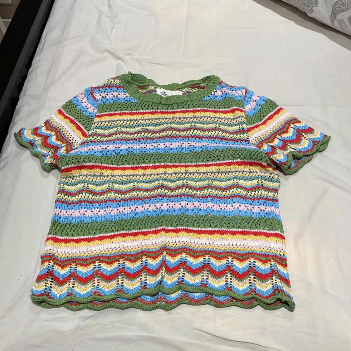 Färgglad stickad topp från Springfield