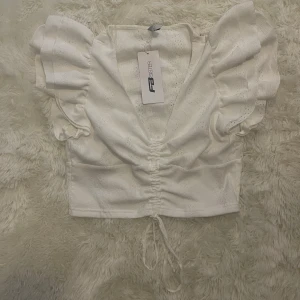 Topp - Söt sommartopp. Storlek XL Aldrig använd 