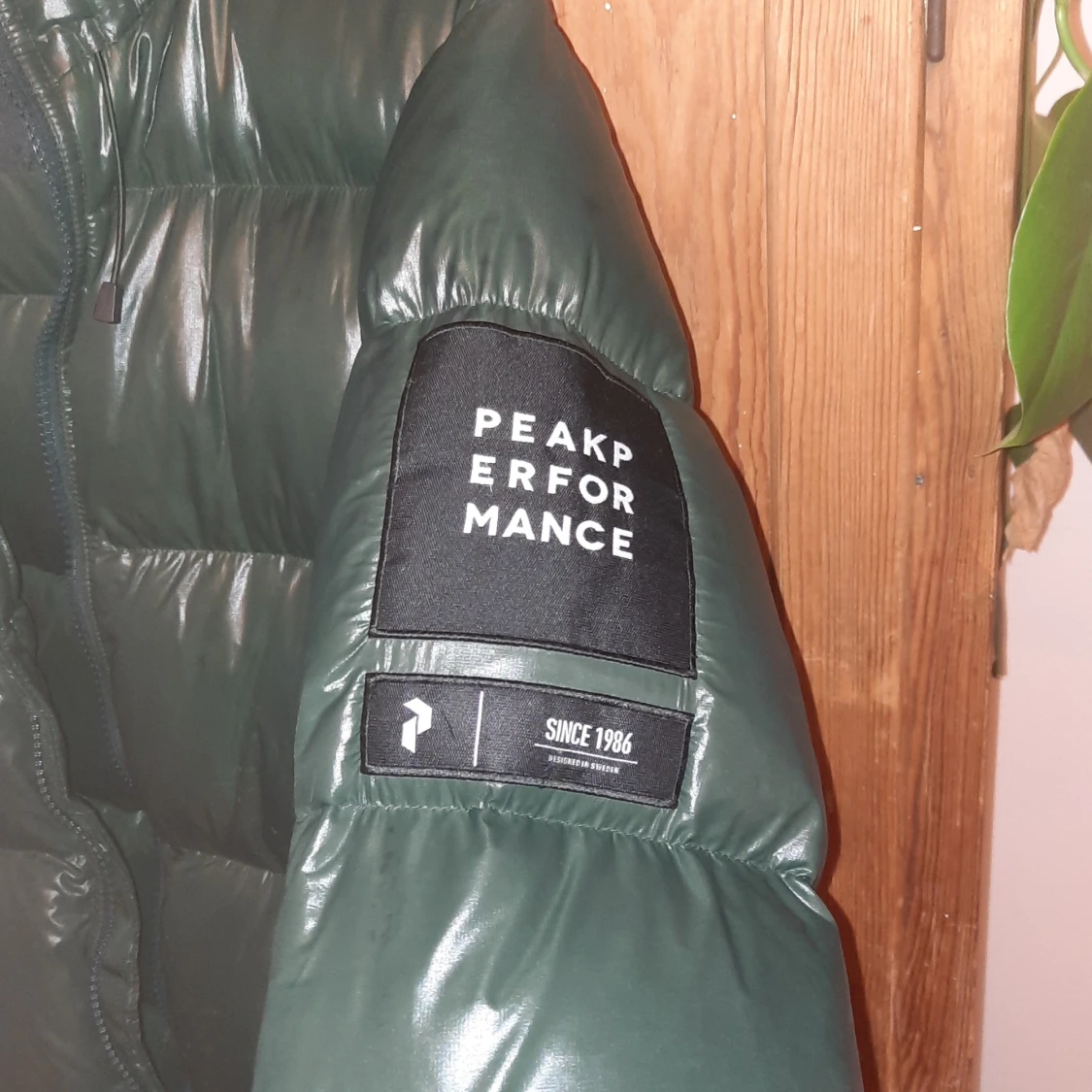 Grön pufferjacka från Peak Performance - 91