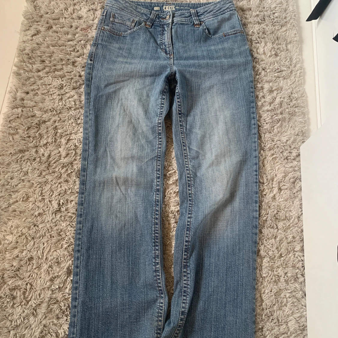 Jeans med fickor