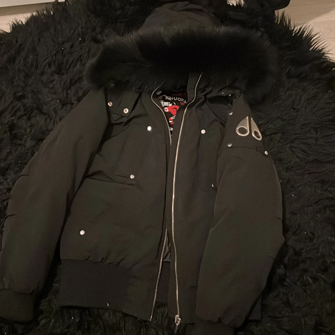 Svart pufferjacka från Moose Knuckles - 93