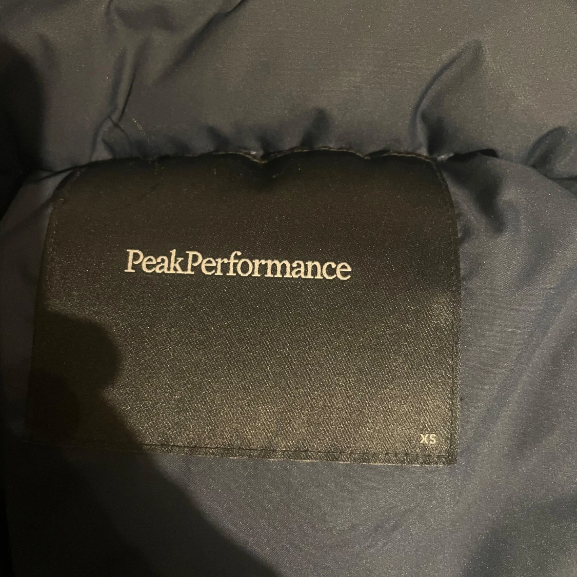 Mörkblå dunjacka från Peak Performance - 93