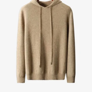 Beige hoodie i merinoull - Säljer en supermjuk beige hoodie i merinoull. Perfekt för kyliga dagar med sin varma och sköna känsla. Den har en klassisk design med långa ärmar och dragsko i huvan. Ett måste för garderoben!