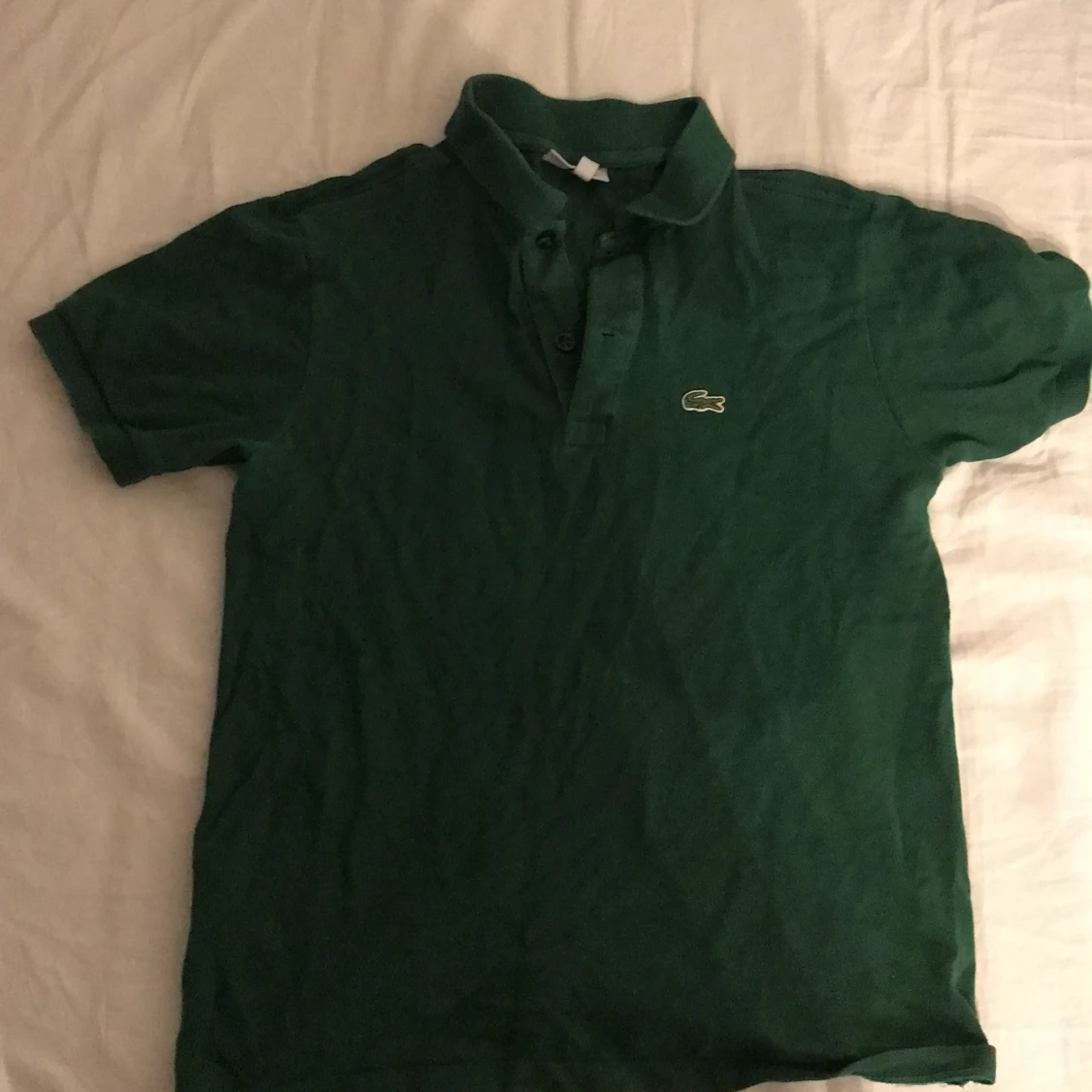 Grön pikétröja från Lacoste