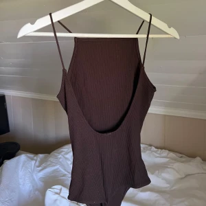 Body - Hm body. Öppen rygg. Strl s. Fint skick