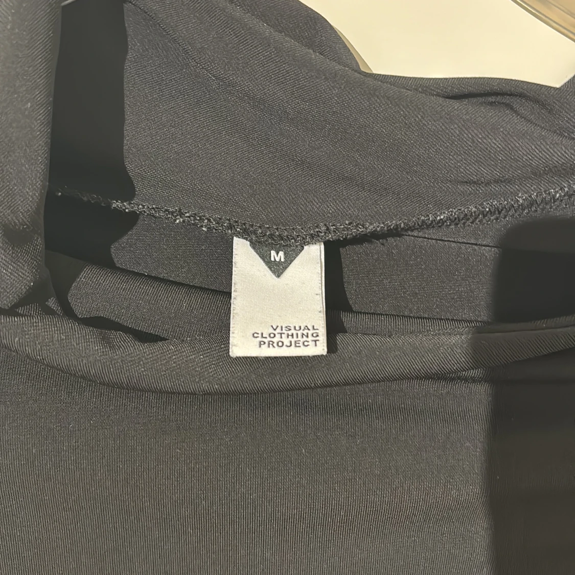 Svart långärmad topp från Visual Clothing Project - 91