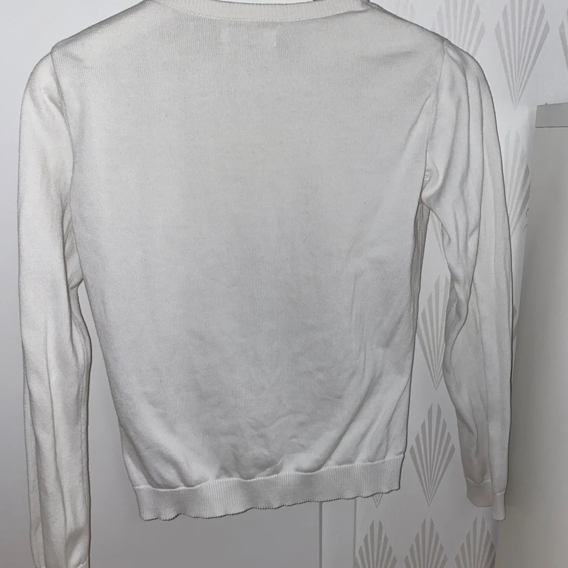 Vit kofta med knappar - 90