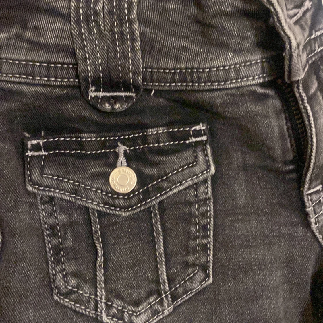 Svarta bootcut jeans från Gina Tricot - 92