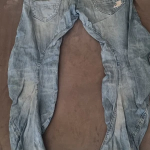 G-STAR - Arc loose tapered gstar jeans i använt skick