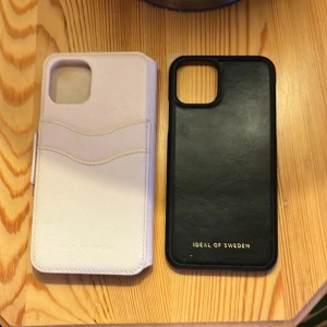 Plånboksfodral från ideal of Sweden!💗 - Rosa och svart ”läder”! Kan säljas enskilt för 40kr styck, priset kan sänkas!💗