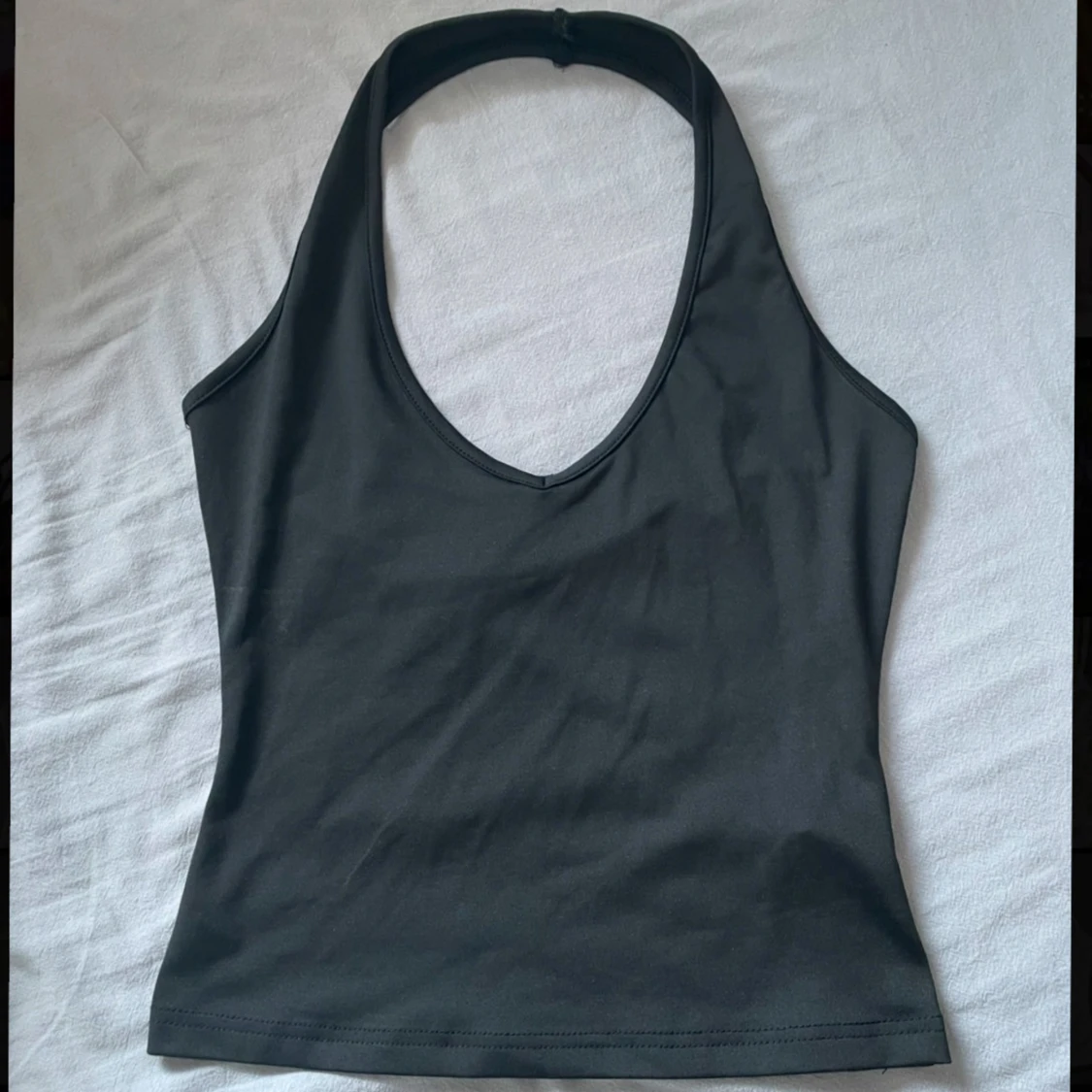 Svart halterneck linne