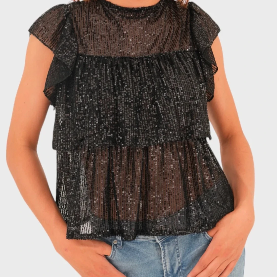 Slutsåld Svart glittrig topp från Meet Me There