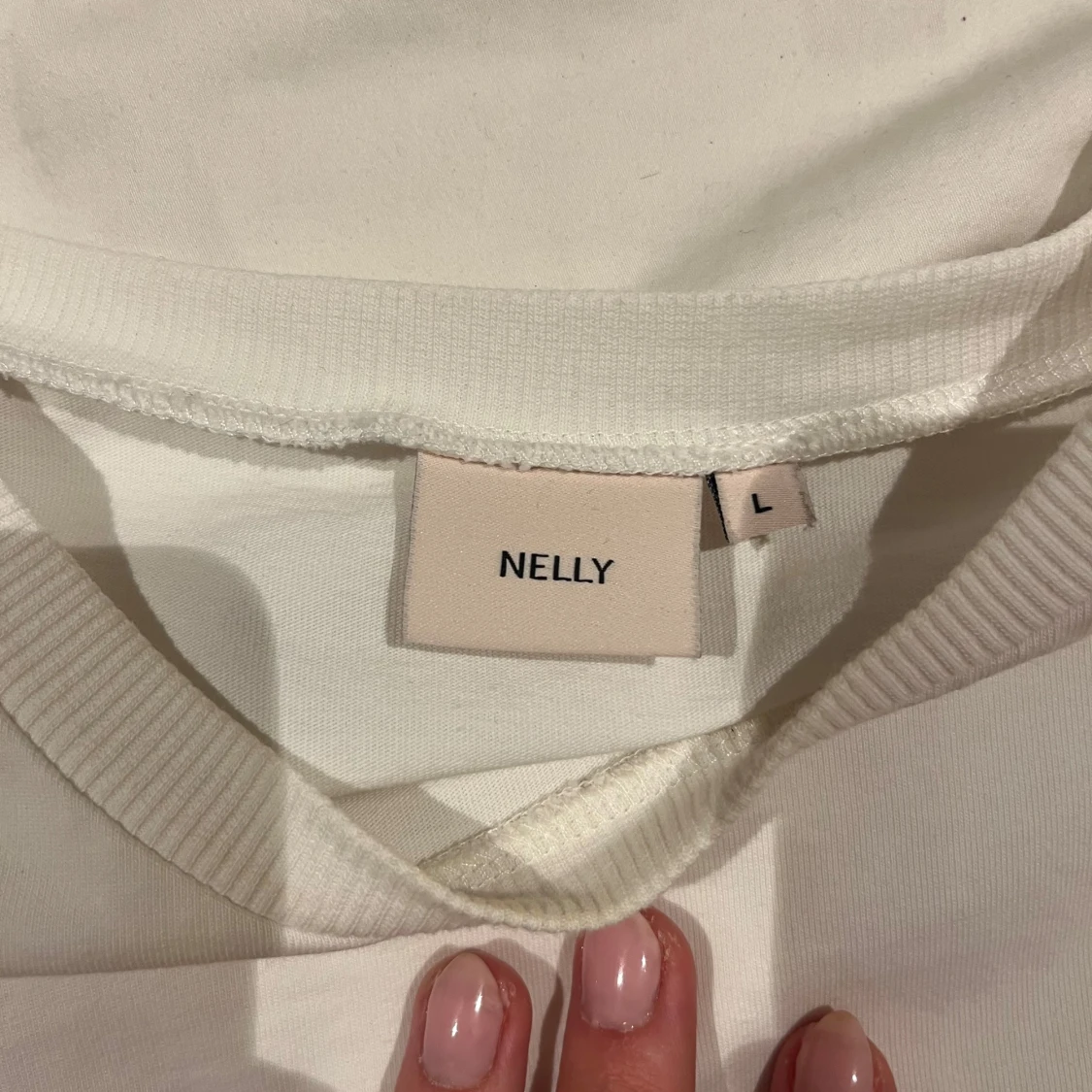 Vit topp från Nelly - 2