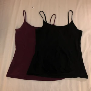 Ett vinrött & ett svart linne - De är två likadana linnen bara att det är olika färger. Har bara testat dem men tyckte inte riktigt att de passade mig. Det är helt enkelt två basic linnen i färgen svart och vinröd. Materialet är väldigt mjukt och skönt, de har även spännen som man kan spänna åt. Det är 50kr st.