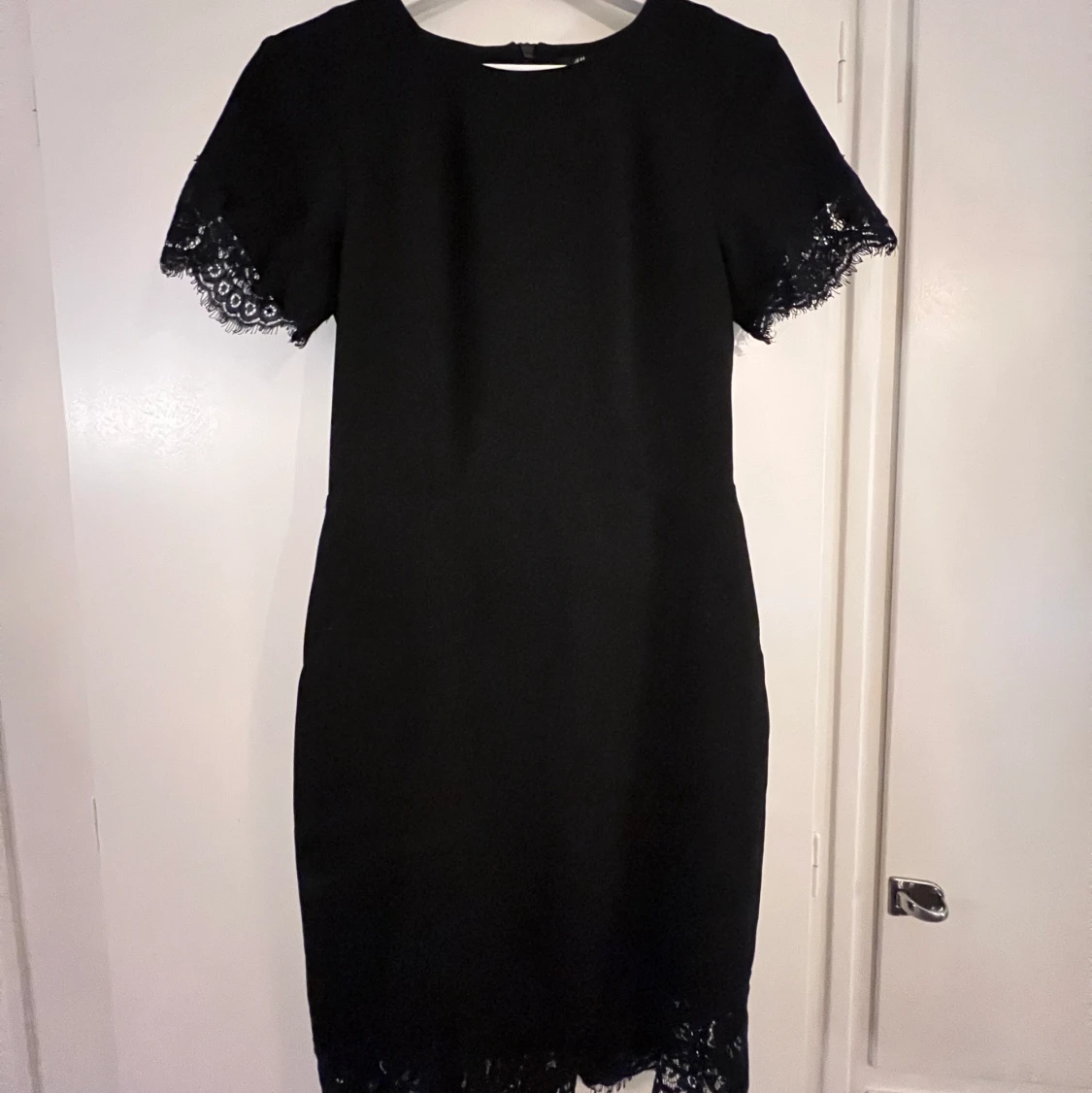 Svart kostymklänning