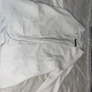 Kavaj - Kavaj från gina , aldrig använd, slid vid varje armslut. två fickor som på bilden