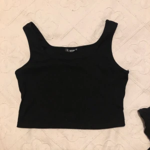 Topp - Svart topp