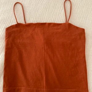 Crop Top - Cropped thin strap tank top. Size M but fits S. DM for more pictures.