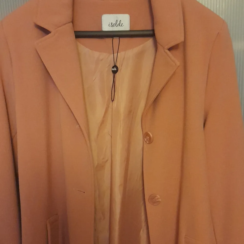 EN ROSA KAPPA använt den två gånger den är som ny.köparen står för frakt. den är mer rosa än det ser ut i bilden . Jackor.