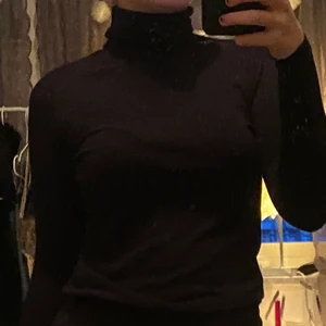 Svart polo  - Snygg svart polo