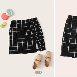 Rutig kjol - Bra skick och använd endast en gång till en skolavslutning, efter det aldrig använd. 