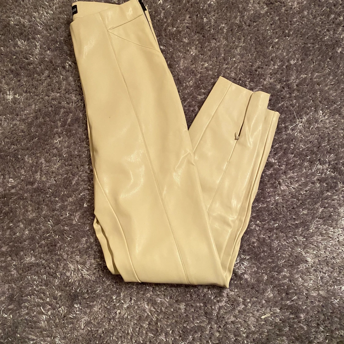 Beiga läderbyxor