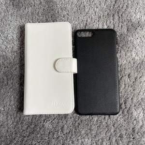 Plånboksskal till iPhone 7/8+. Det vita är aldrig använt men det svarta är använt en del. Skriv så kan jag skicka fler bilder på detaljer. Köparen står för frakt.