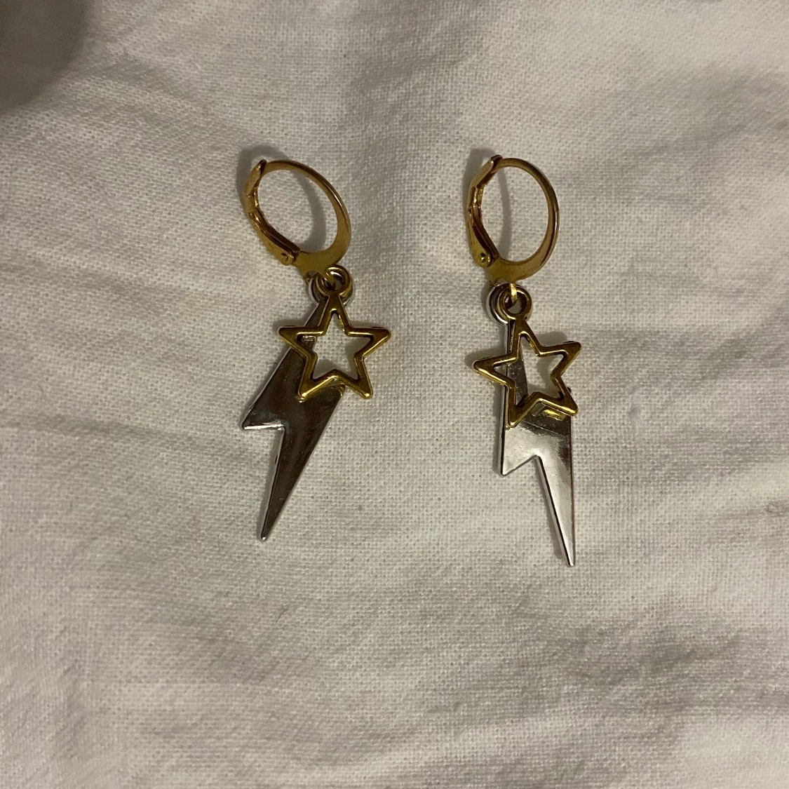 Blixt o stjärnörhängen - 91