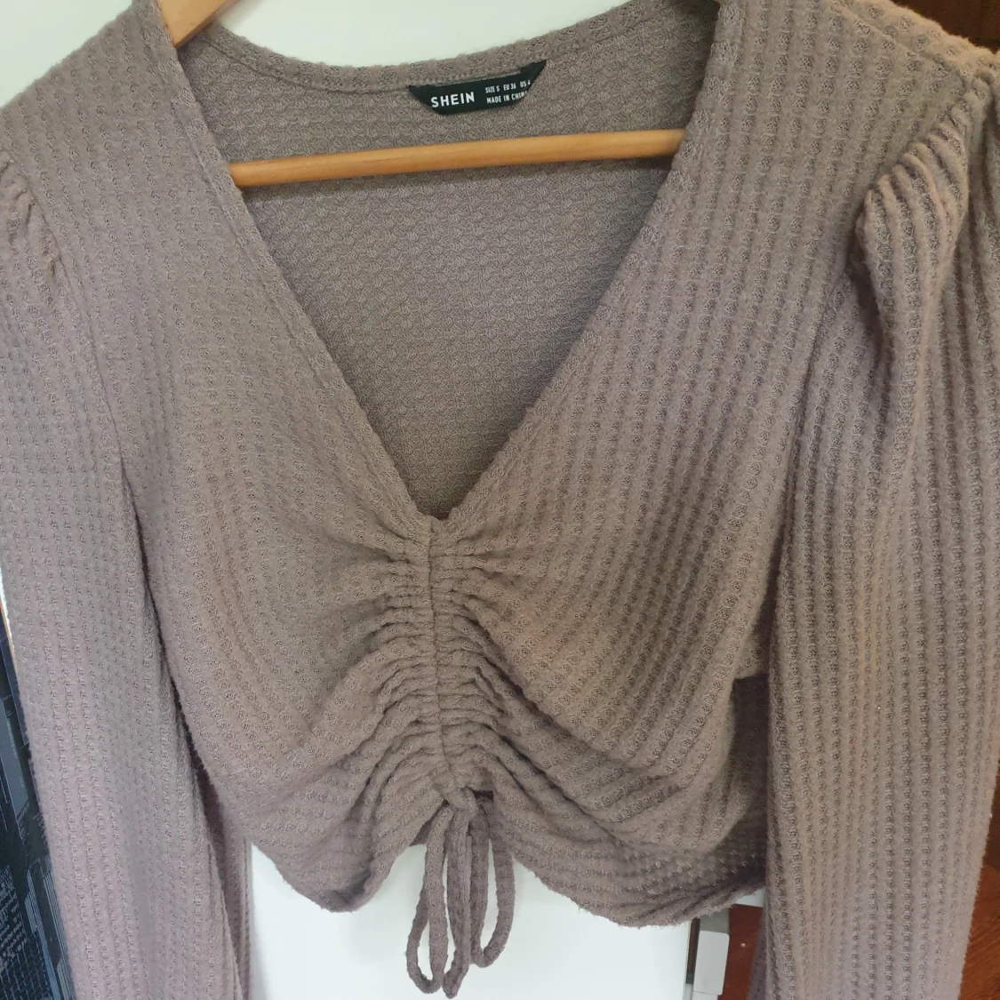 Smutsrosa tröja med justerbar framsida - 91