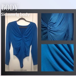 blå skimrande body - Storlek -> XL , sällan använd. 