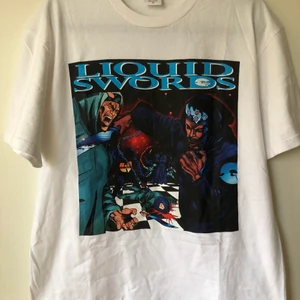 Supreme x Gza Liquid Swords Tee - Supreme x Gza Liquid Swords T-Shirt  Size medium, fits like a regular men’s size medium.  Excellent condition, no flaws or damage.  DM if you need exact size measurements.   Buyer pays for all shipping costs. All items sent with tracking number.   No swaps, no trades, no offers. 