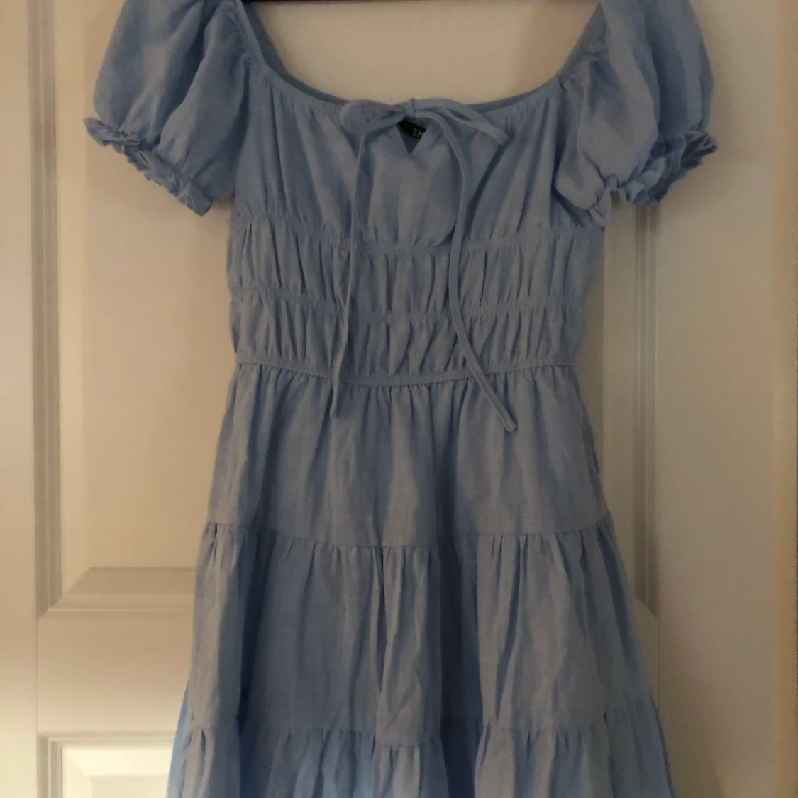 Söt ljusblå klänning - 90