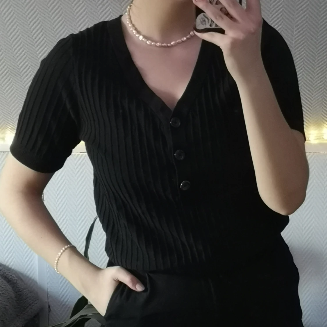 Ribbad topp med knappar 