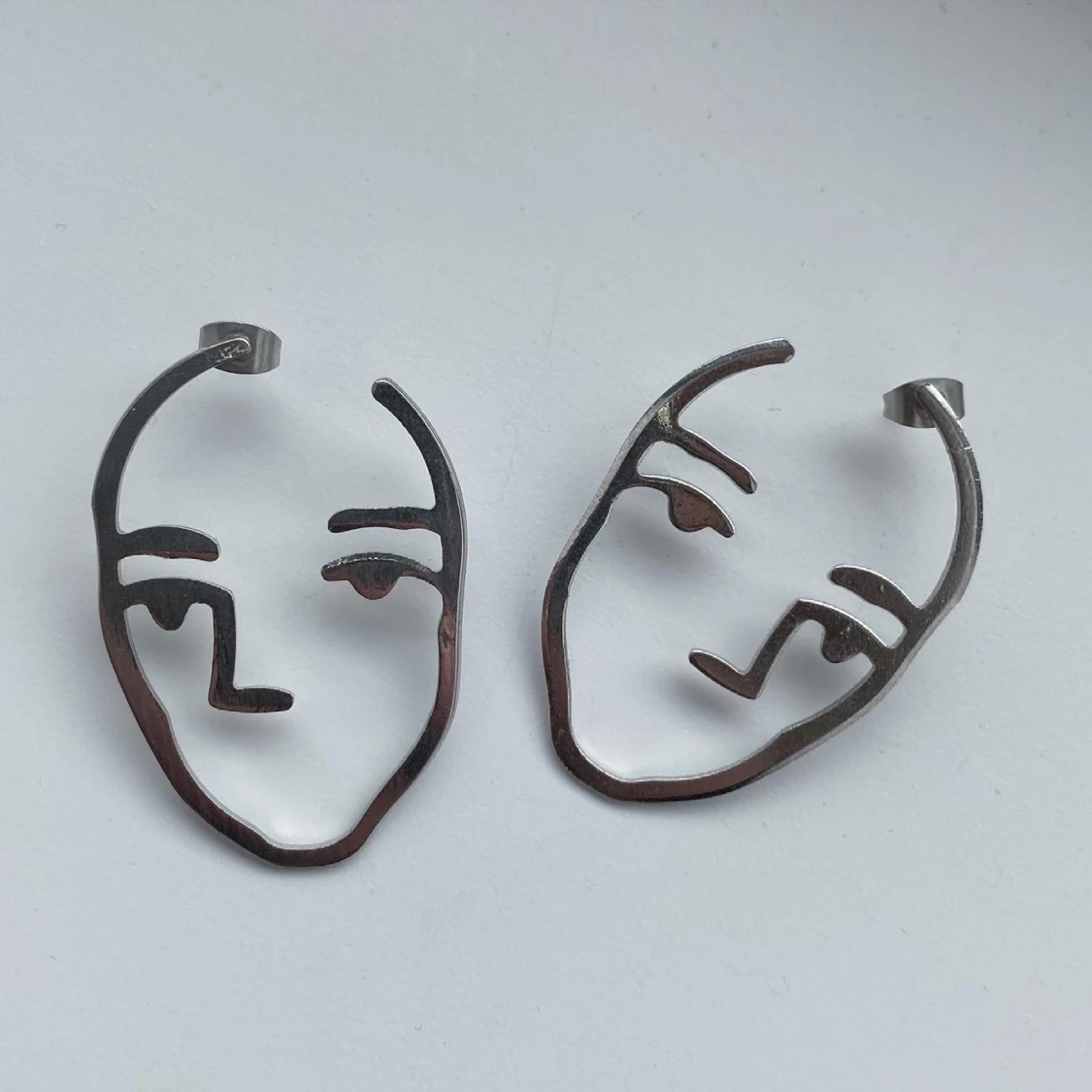 Silvriga örhängen - 90