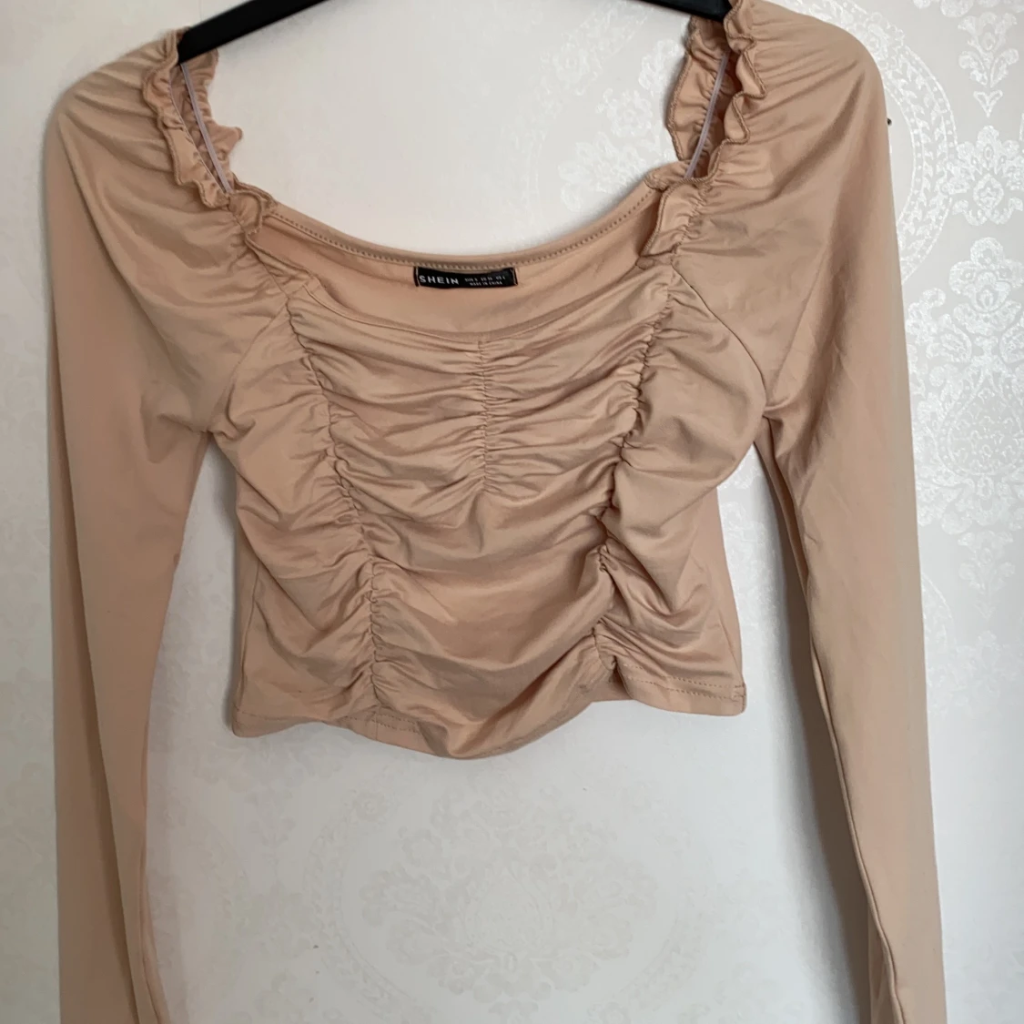 Beige färgad tröja