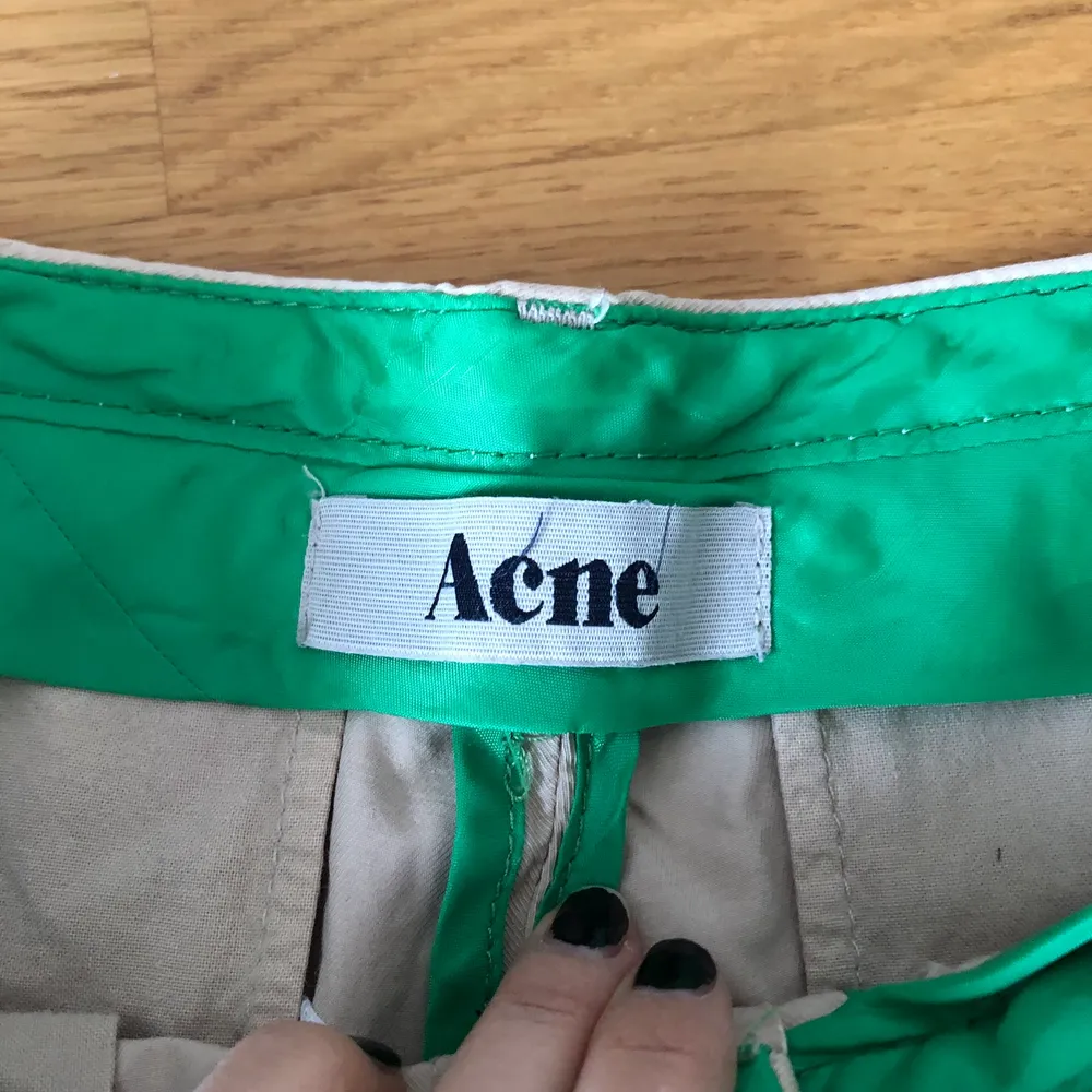 super nice vintage Acne shorts with green inseams! selling them because they dont fit 💔 in great condition! tag says its a size XS but fits up to an M! . Shorts.