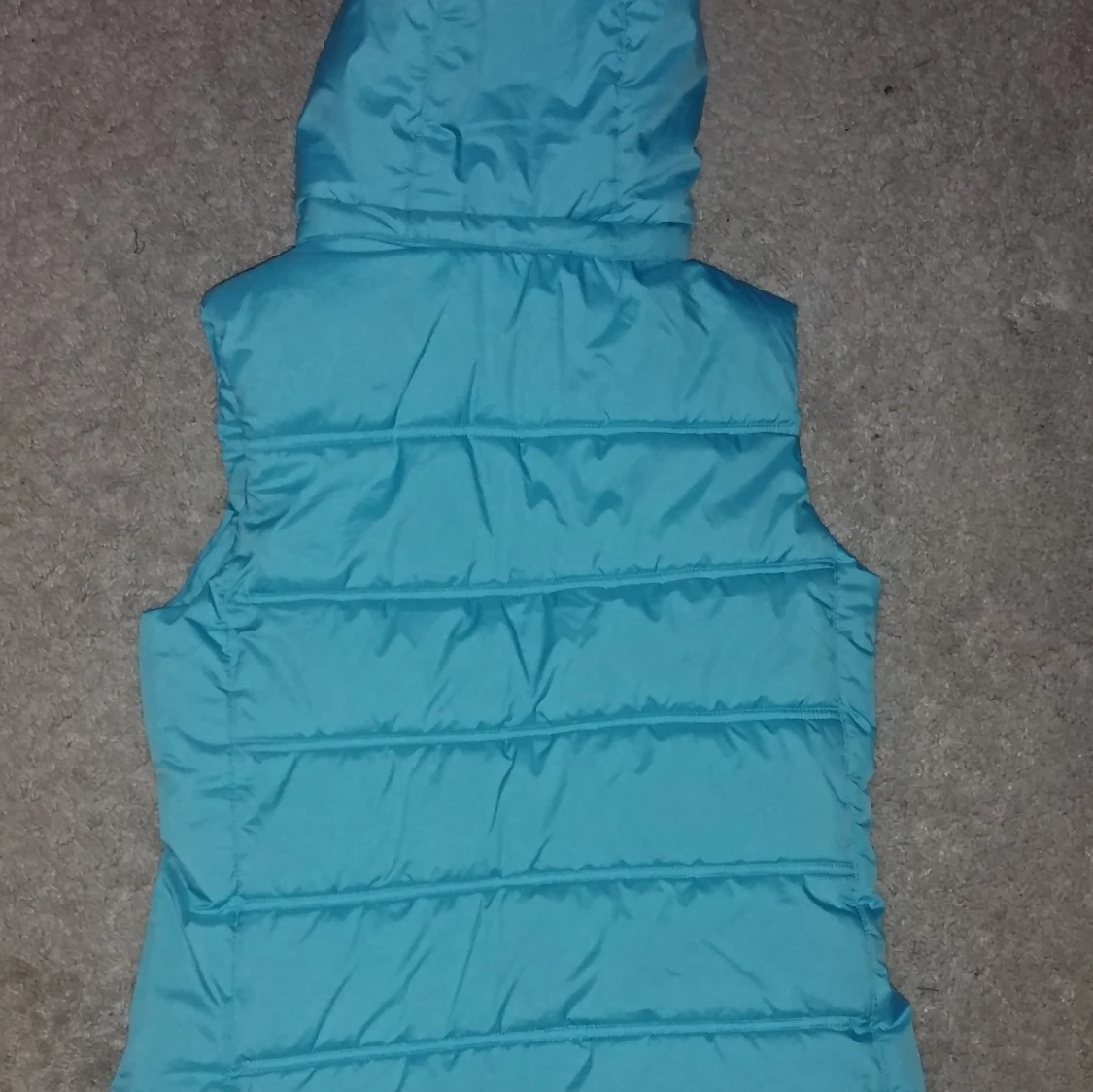 Ljusblå puffer vest - 90