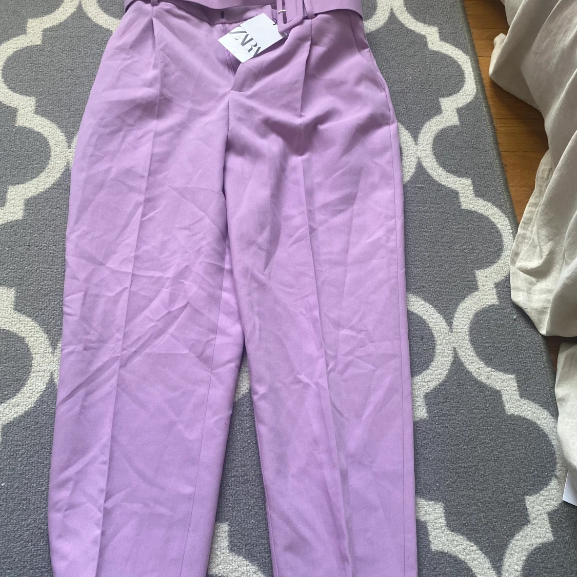 Oanvända kostym byxor