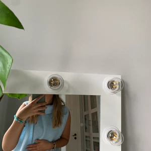 Stickad Ljusblå väst  - En jätte fin stickad blå väst. Använd kanske två gånger. Orinalproset låg på 400kr 