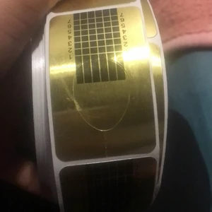 Nails  -  I kind of forgot the name of it but you just take nail gel or anything and make a nail out of it