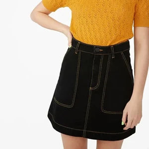 black denim skirt with yellow stitching  - black denim skirt with yellow contrast stitching from monki, worn once. super cool and has pockets!!!!!! 