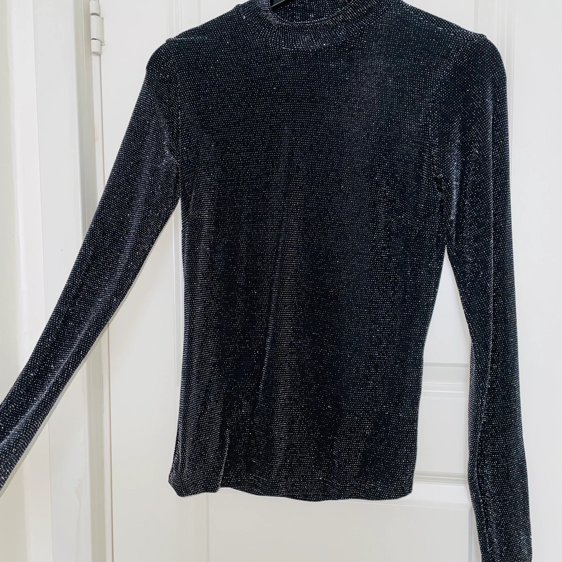 Glittrig top/tröja - 90