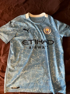 Man City 20/21 hemmatröja  - Man City 20/21 hemmatröja i mycket bra skick. Storlek 158-164 cm