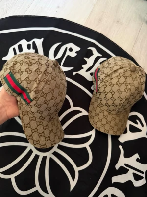 GG beige cap - One size fits all/ adjustable size, true to size. Very comfortable and fits nicely. Brand new