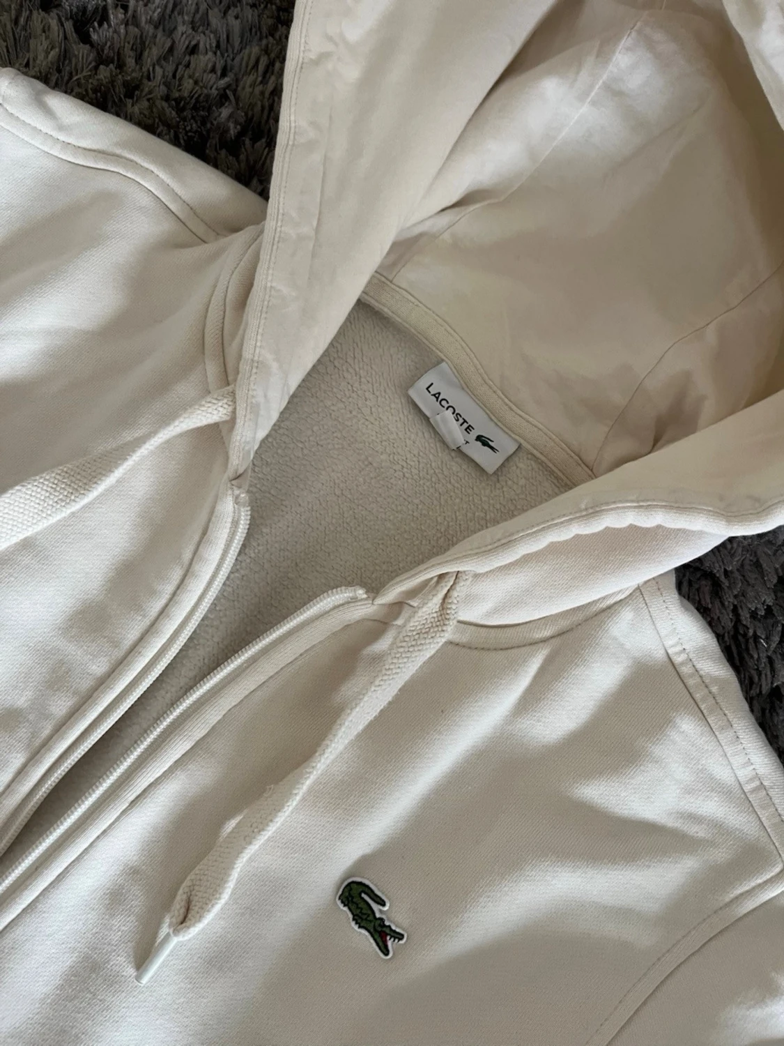 Vit hoodie med dragkedja från Lacoste - 1
