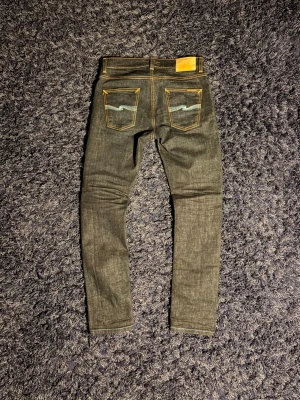 Limited edition Nudie jeans - Säljer ett par sjukt feta Nudie jeans som är limited edition och säljs inte längre. Modellen är lean Dean och sitter snyggt på. De är använda fåtal gånger, hör av er vid minsta fundering!