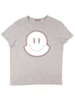 Moncler Smile T-Shirt - Information about the product: Made of 100% Cotton. Moncler Smile print at the front.  Condition: This t-shirt is in Good condition with some slight cracking to the front print. 